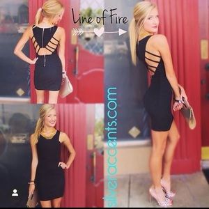 Main strip black body con dress